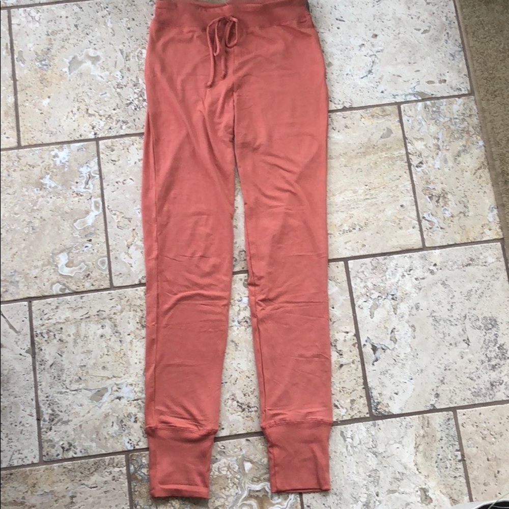 Small rust colored joggers/leggings